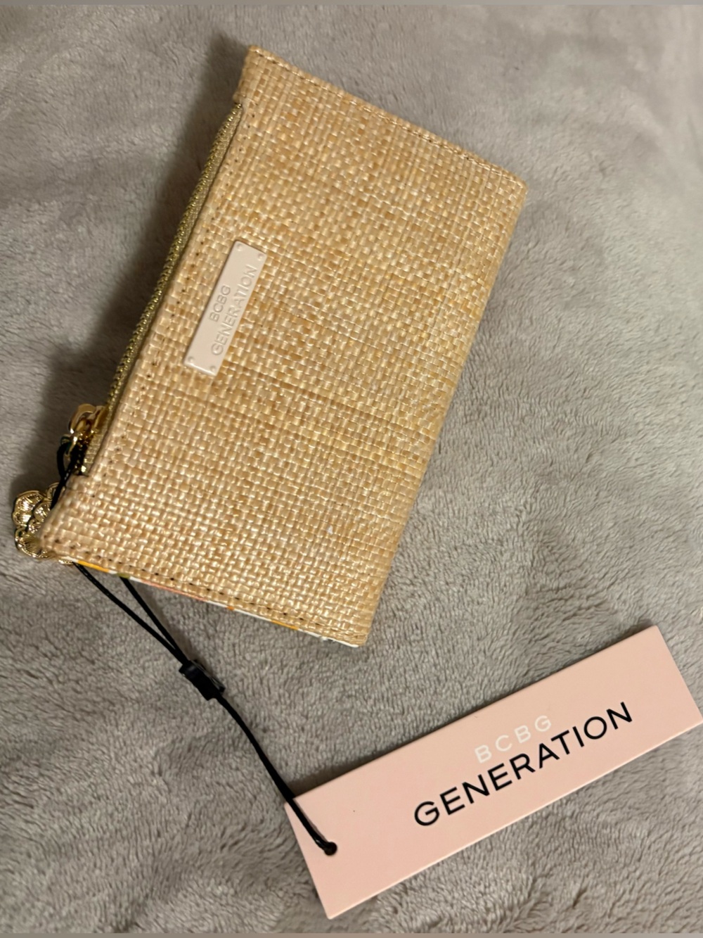 BCBG Straw-Textured Zip Wristlet with Gold Charm - Natural Beige
